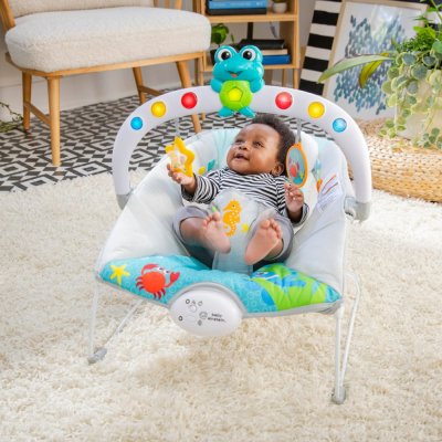 BABY EINSTEIN Musikwippe mit Vibration und Lichtern Kick to It Neptune bis 9 kg
