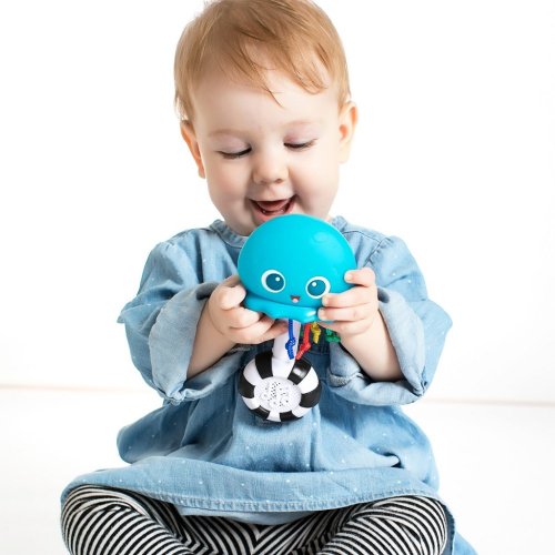BABY EINSTEIN Glasbena in svetlobna igrača Ocean Glow Sensory Shaker™ 0m +