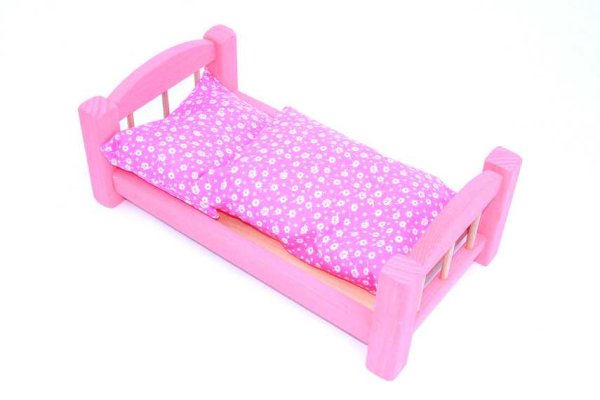 Pink wooden doll cot