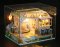 2Kids Toys Miniatura de casa de muñecas Cafetería para gatos con jardín