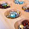 Bigjigs Toys Mankala-Spiel mit Kieselsteinen
