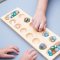Bigjigs Toys Mankala-Spiel mit Kieselsteinen