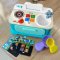 BABY EINSTEIN Zenés játék Magic Touch Kitchen™ Pretend to Cook HAPE 9m+