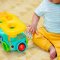 BRIGHT STARTS Steckspielzeug-Auto mit Bällen Pop & Roll Safari Bus™ 6m+