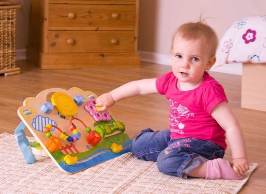 Bigjigs Baby Placa de atividades em madeira com flores