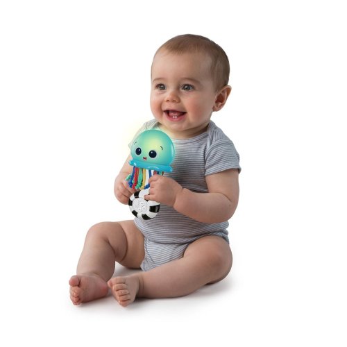 BABY EINSTEIN Glasbena in svetlobna igrača Ocean Glow Sensory Shaker™ 0m +