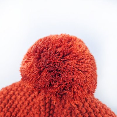 Kapa pletena z vezalkami in cofki LA Outlast ® - terakota