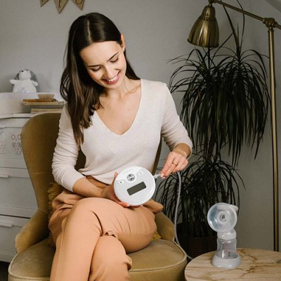 BABYONO Elektrische Milchpumpe Nurse Pro + Stilleinlagen 100 + 40 GRATIS