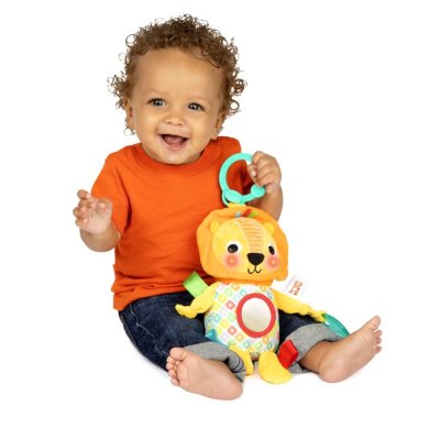 BRIGHT STARTS Spielzeug mit Melodie am C-Ring Löwe Huggin' Lights ™0m+