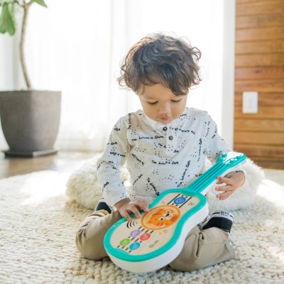 BABY EINSTEIN Muziekspeelgoed houten ukulele Magic Touch HAPE 6m+