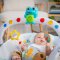 BABY EINSTEIN Musikwippe mit Vibration und Lichtern Kick to It Neptune bis 9 kg