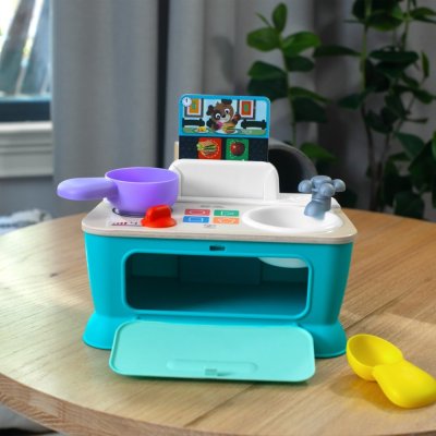 BABY EINSTEIN Jucărie muzicală Magic Touch Kitchen™ Pretend to Cook HAPE 9m+