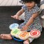 BABY EINSTEIN Zabawkowe drewniane bębny muzyczne Magic Touch HAPE 6m+