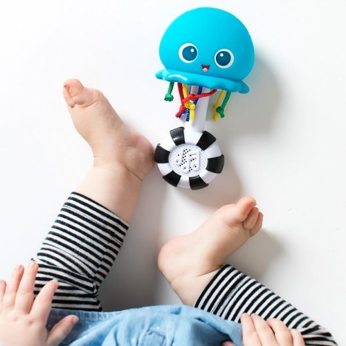 BABY EINSTEIN Jucărie muzicală și ușoară Ocean Glow Sensory Shaker™ 0m +