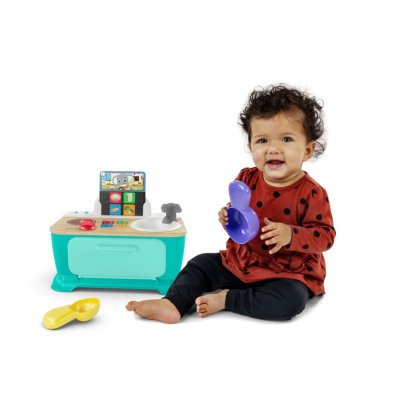 BABY EINSTEIN Μουσικό παιχνίδι Magic Touch Kitchen™ Προσποιείται ότι μαγειρεύει HAPE 9m+