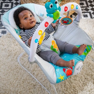 BABY EINSTEIN Musikwippe mit Vibration und Lichtern Kick to It Neptune bis 9 kg