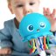 BABY EINSTEIN Zabawka muzyczna i świetlna Ocean Glow Sensory Shaker™ 0m+