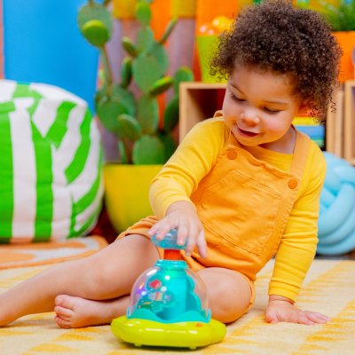 BRIGHT STARTS Musikalisches Leuchtspielzeug Press&Glow Spinner 6m+