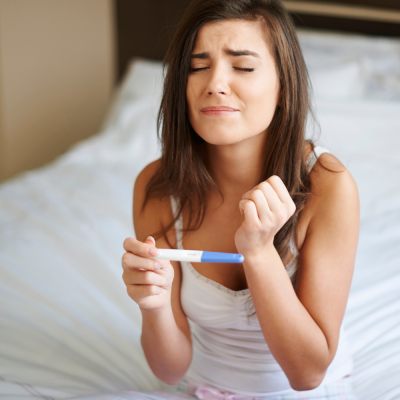 Příznaky PMS vs rané těhotenství