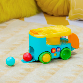 BRIGHT STARTS Steckspielzeug-Auto mit Bällen Pop & Roll Safari Bus™ 6m+