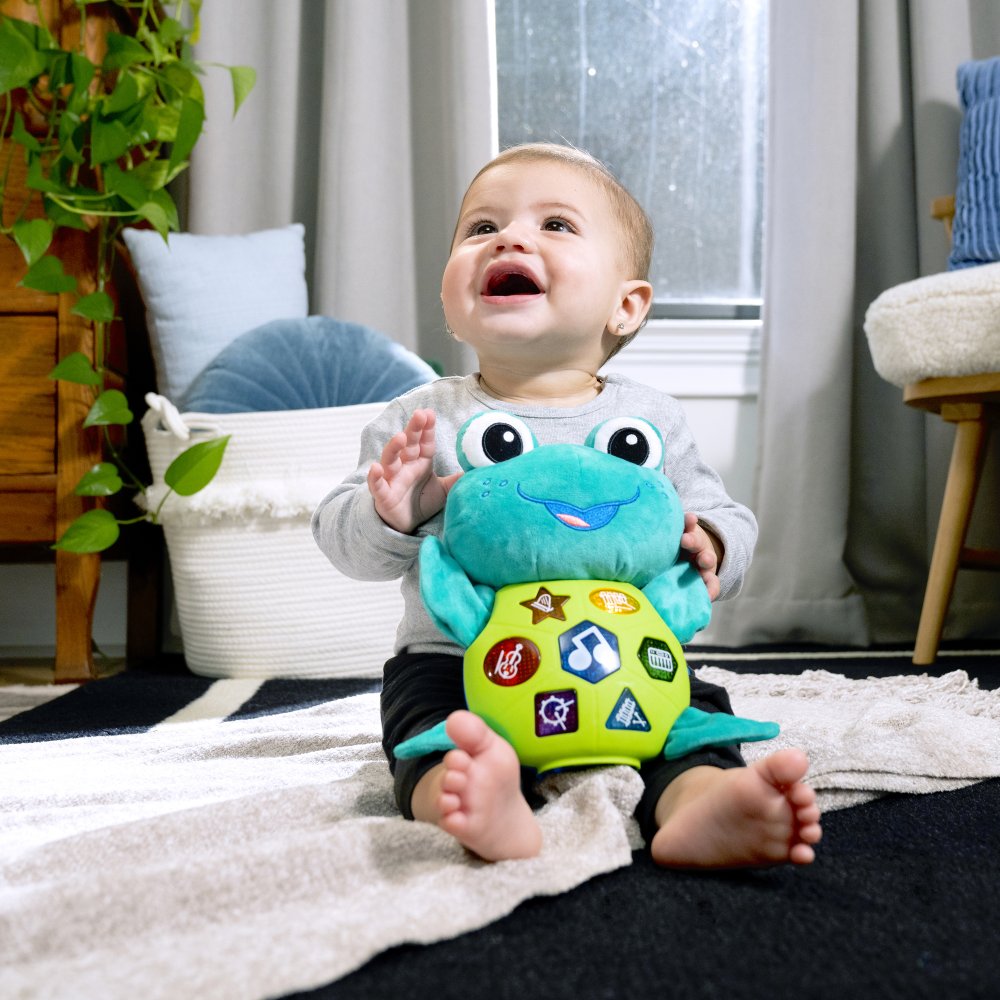 BABY EINSTEIN Hračka Hudební Interaktivní želva Neptune's Cuddly Composer™ 6m+