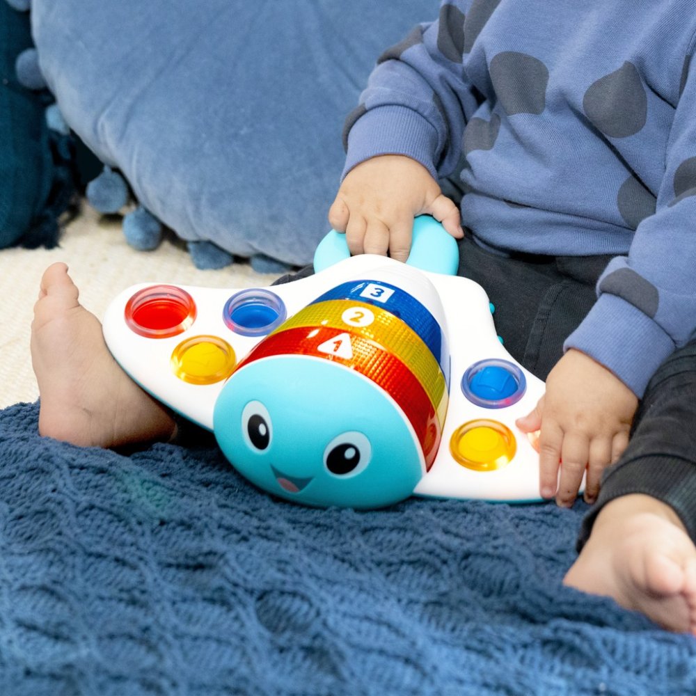 BABY EINSTEIN Hračka Senzorická Ráje Pop & Explore Stingray™ 6m+