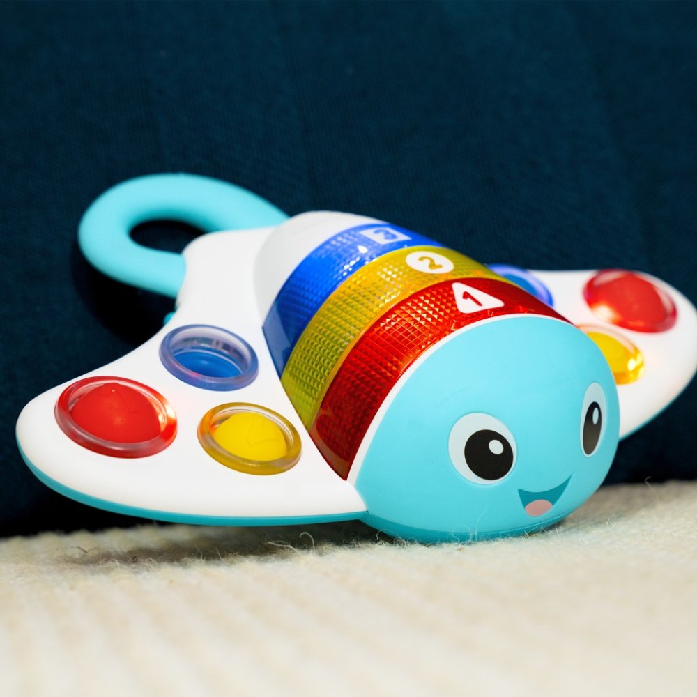 BABY EINSTEIN Hračka Senzorická Ráje Pop & Explore Stingray™ 6m+